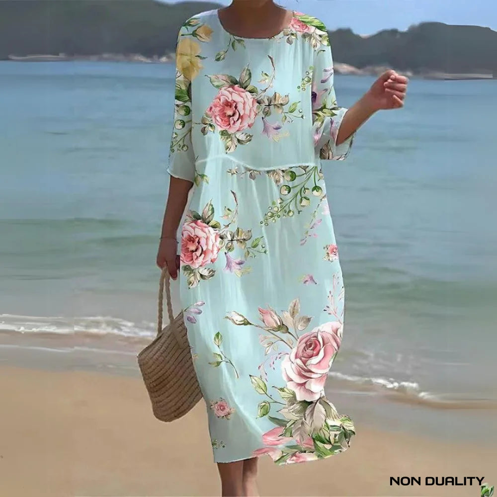 Non Duality | Sea Breeze Dress Lichtblauw En Roze Bloemen / S